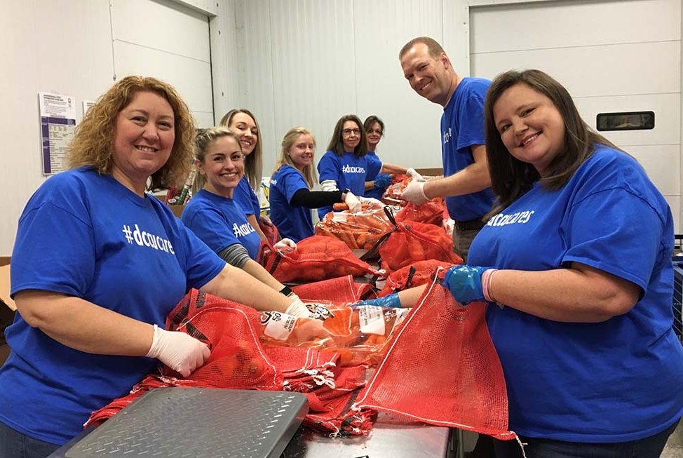 DCCU employee volunteering at the Blue Ridge Area Food Bank