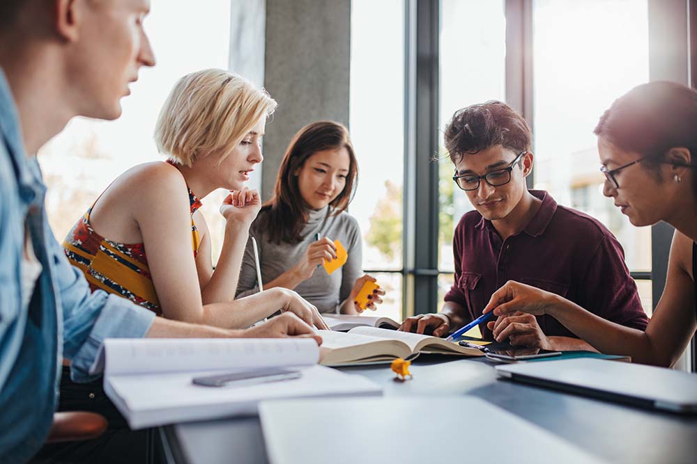 group of college students studying together