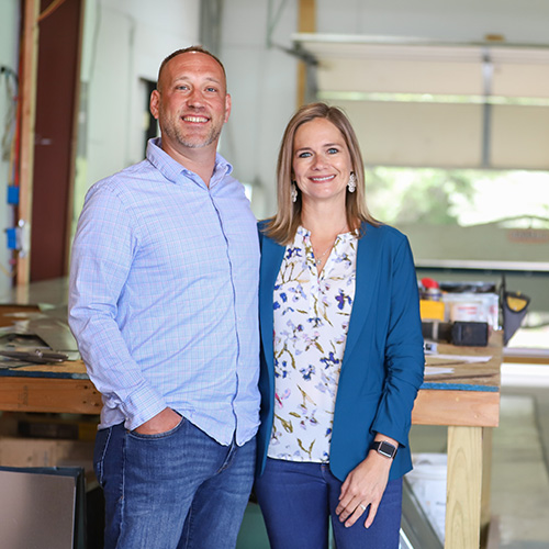 Photo of business owners Chris and Sabrina Lancaster in their workshop at Valley Air, Heating, Cooling, and Plumbing