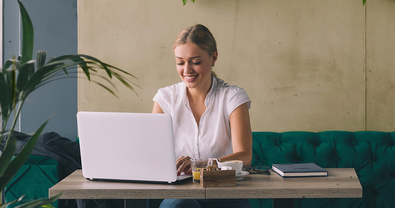 woman looking at laptop