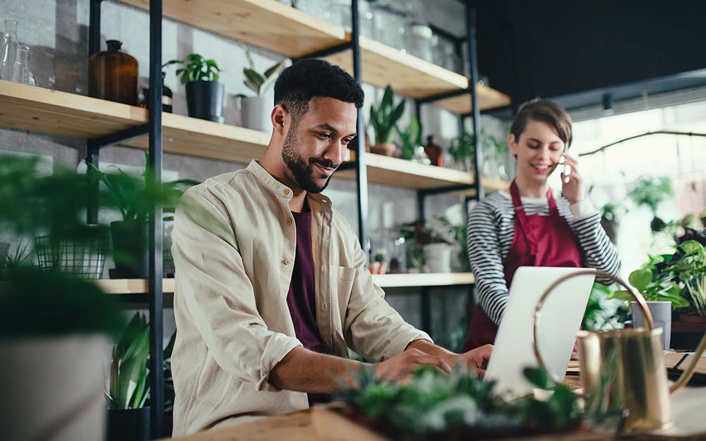 business owners working in retail shop